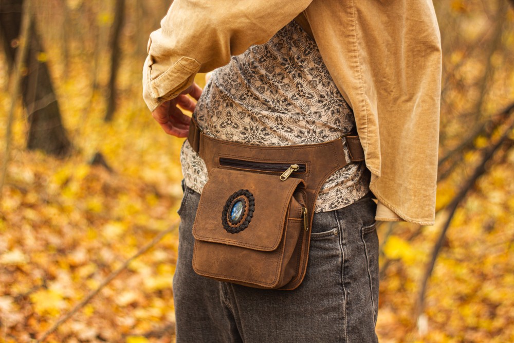 Handmade leather bag with a labradorite semi-precious stone, casual style.