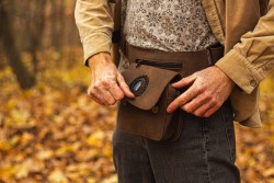 Handmade leather bag with a labradorite semi-precious stone, casual style.